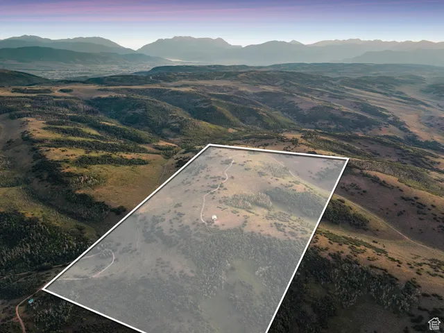 Aerial view of property's location featuring mountains and property boundaries highlighted