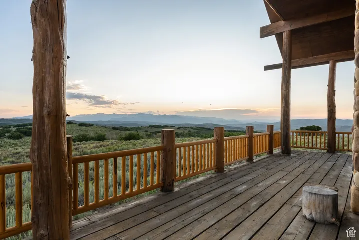 Deck at dusk with a mountain view