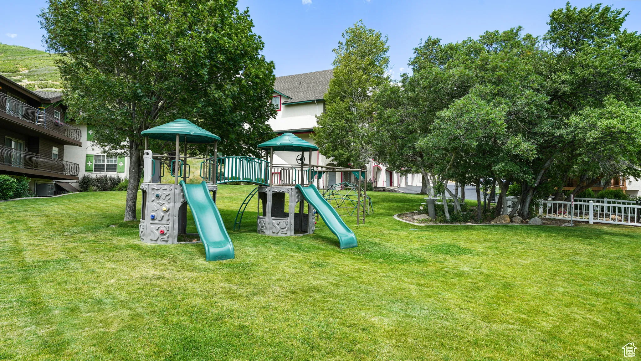 Community playground featuring a yard