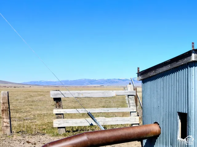 View of shed featuring a mountain view and a rural view