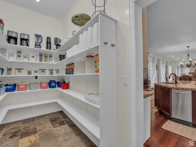 Pantry and view of trash compactor