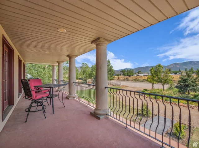 Patio / terrace with a mountain view
