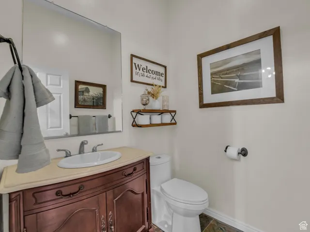 Bathroom with toilet and vanity
