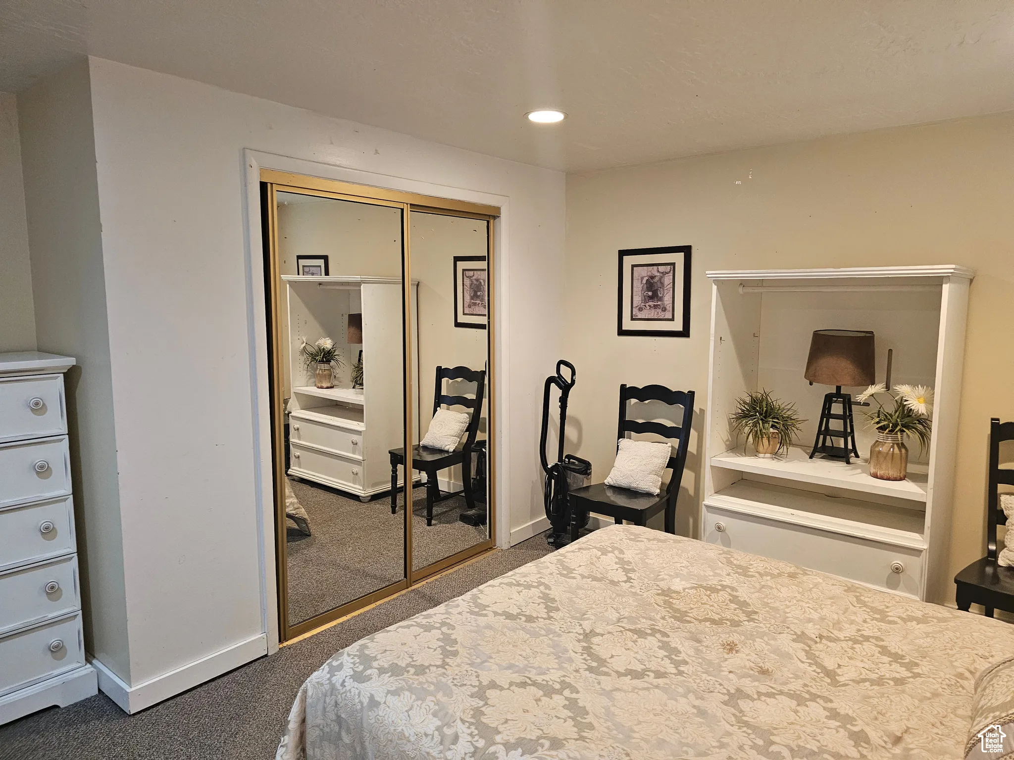 Carpeted bedroom featuring a closet and recessed lighting