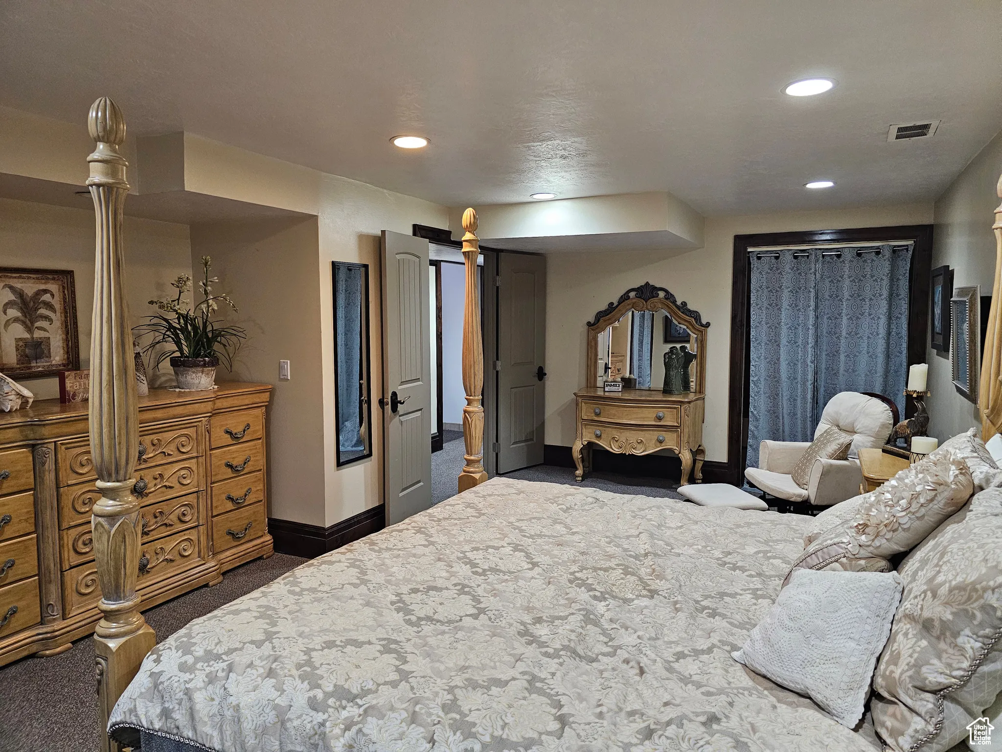 Bedroom featuring dark colored carpet and recessed lighting