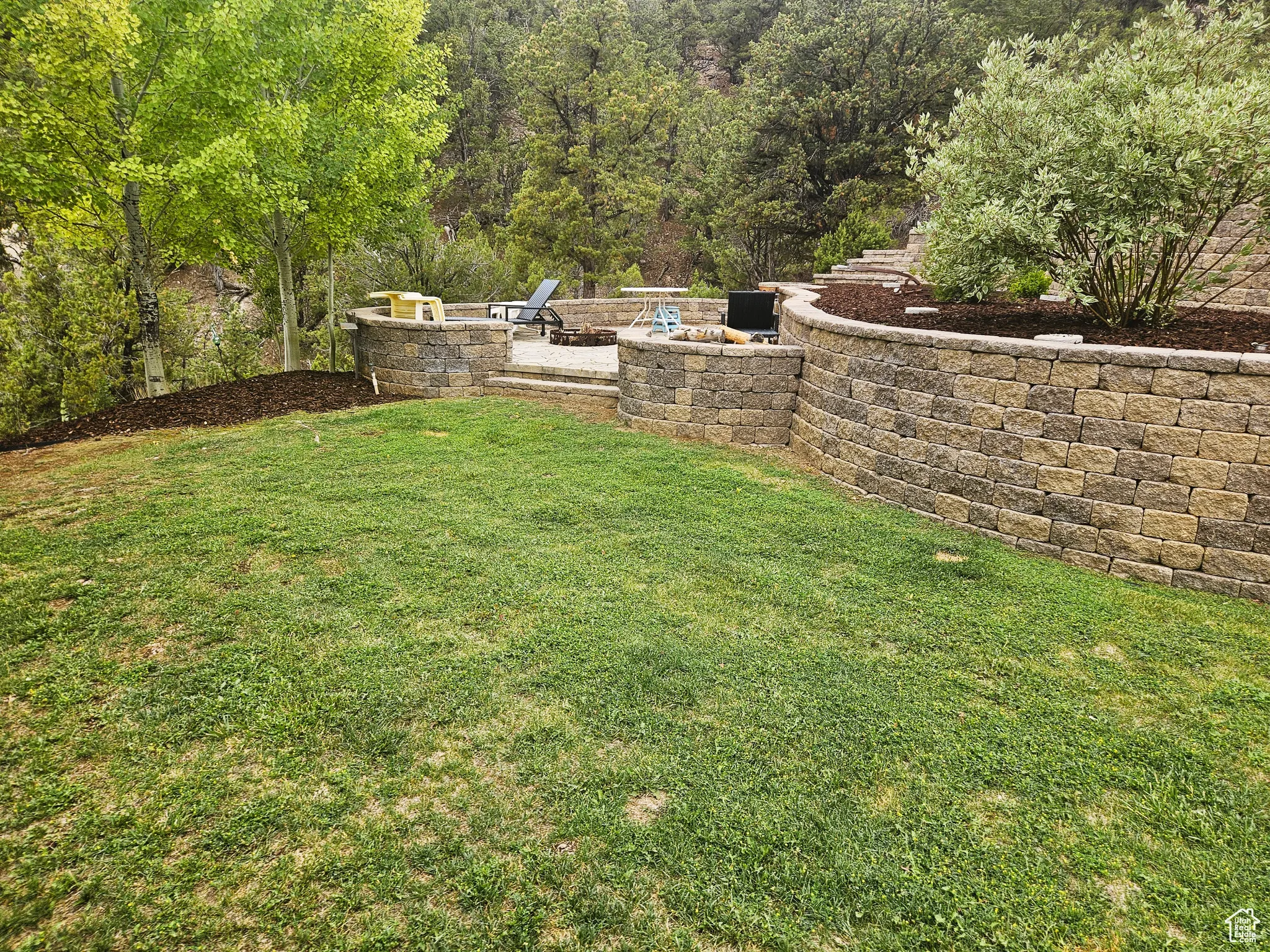 Set on over 10 expansive acres, the property provides ample room for outdoor adventure, quiet reflection, or future development.