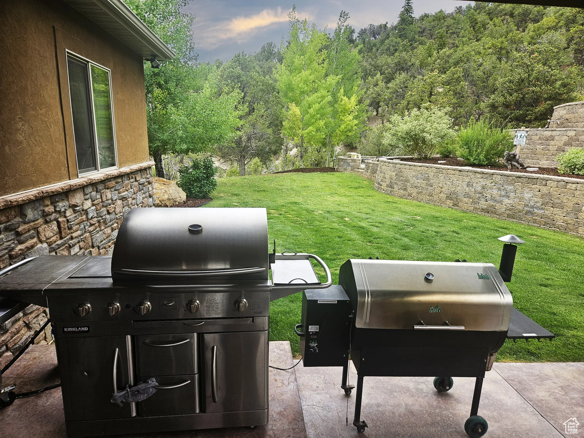 Whether you're preparing a casual lunch or entertaining guests, the covered grilling area offers functionality, comfort, and stunning scenery all in one.