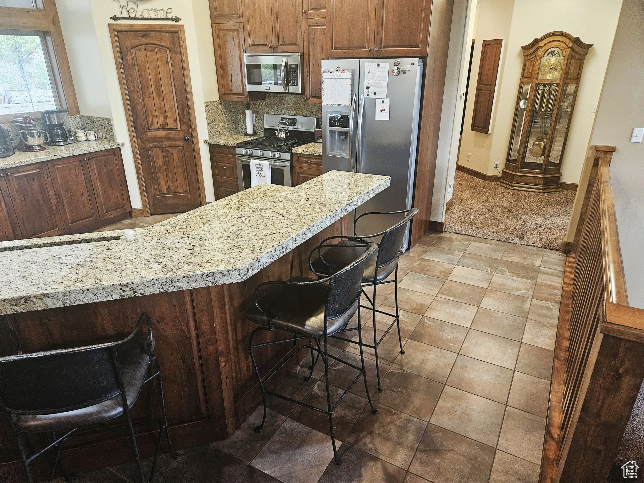 A welcoming angled island designed to keep everyone connected.