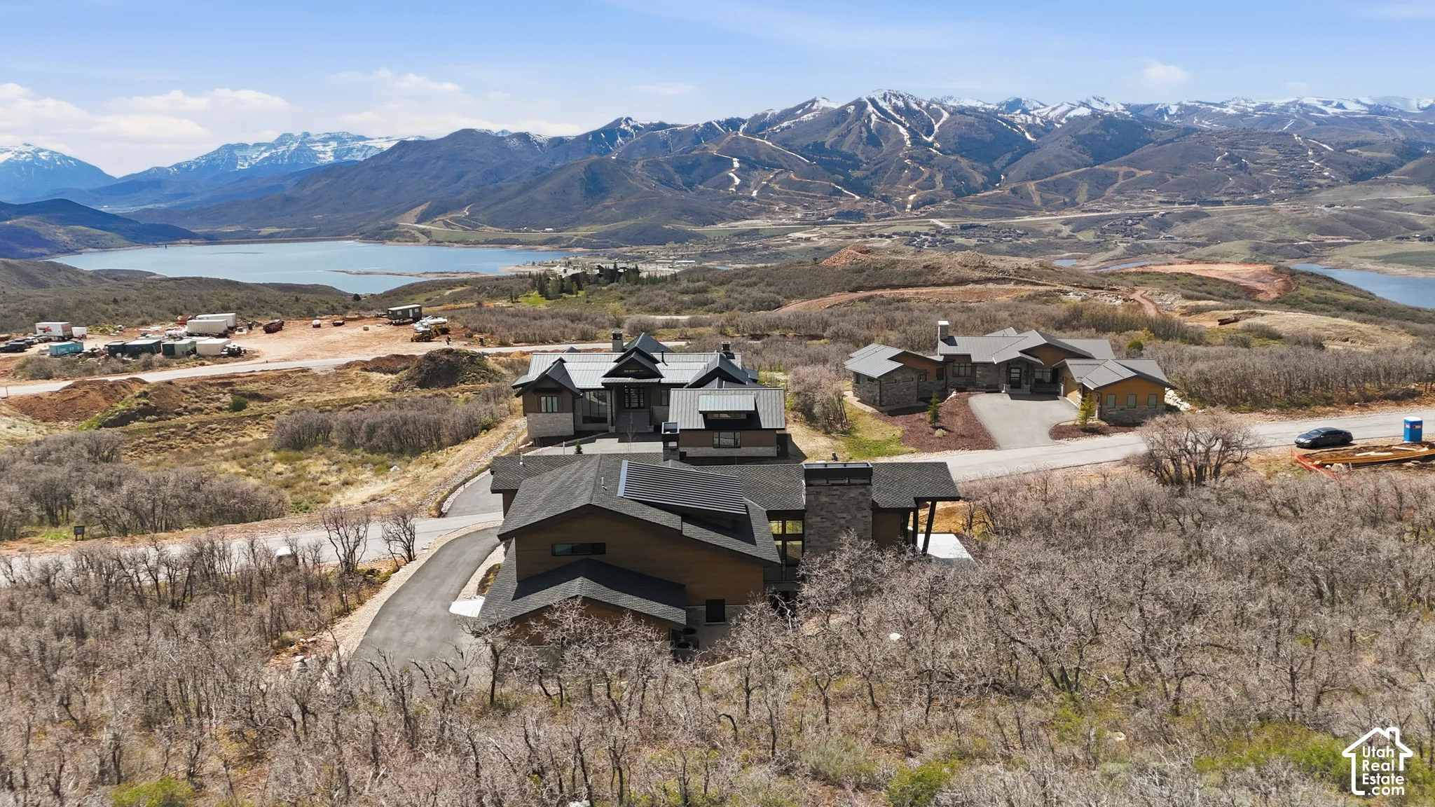 View of mountain backdrop featuring a nearby body of water