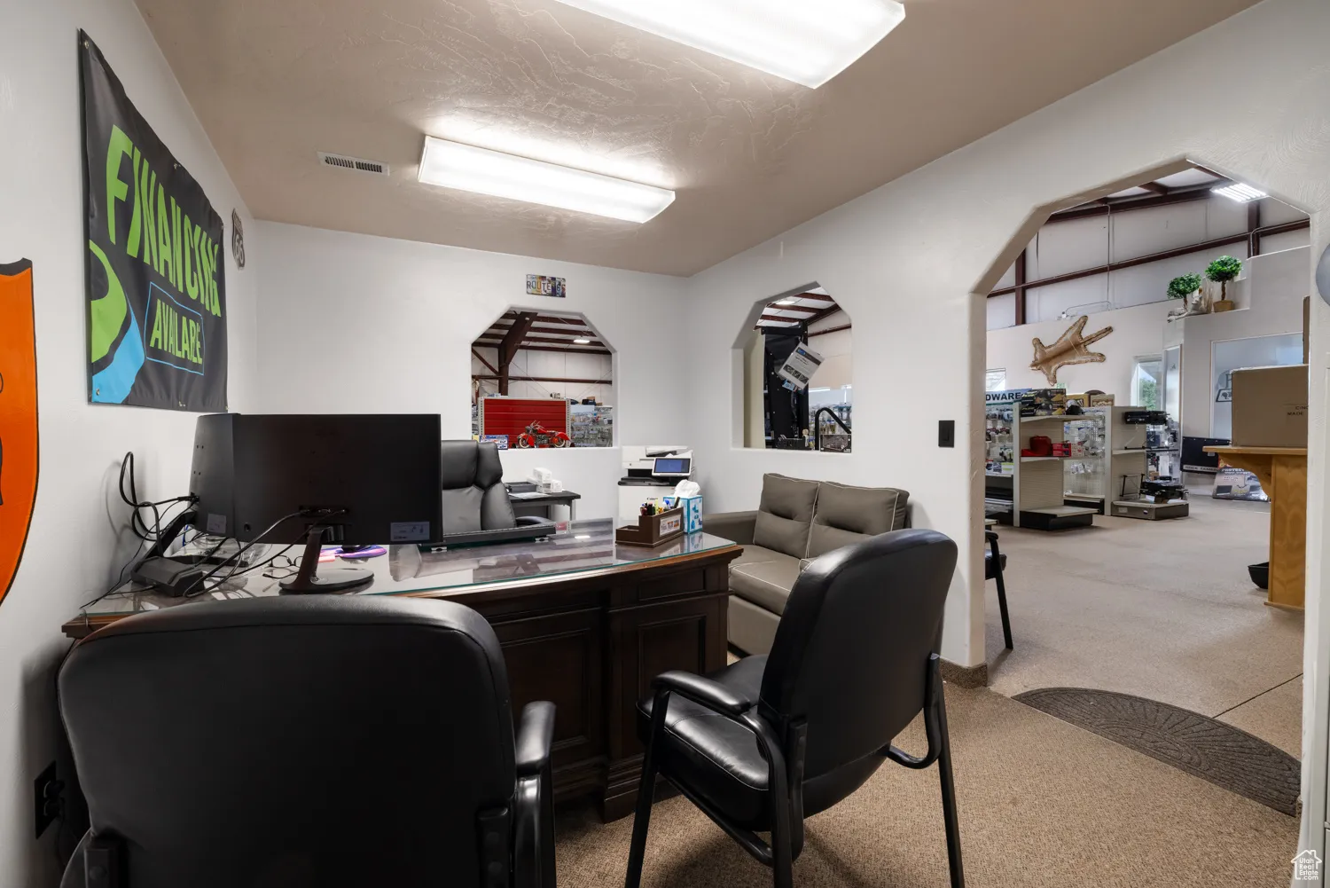 View of carpeted home office