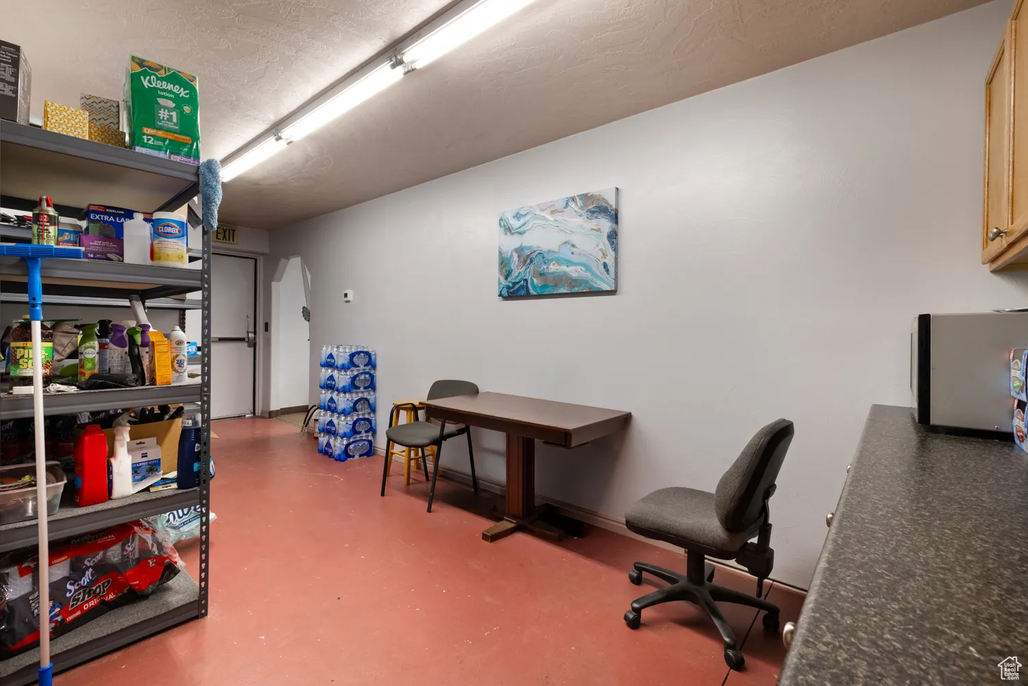 Office space featuring finished concrete flooring