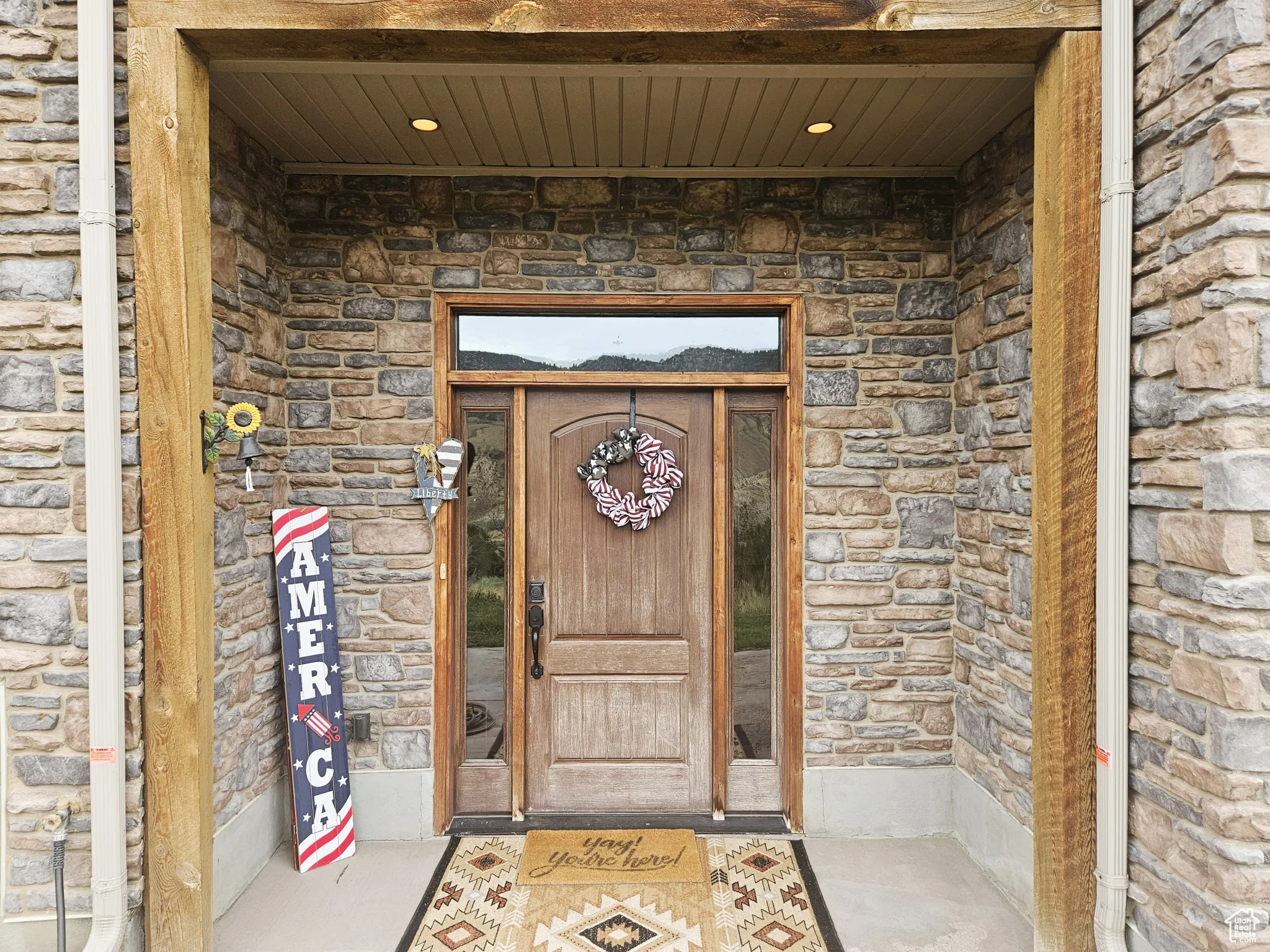 A rustic welcome rooted in stone and sky.