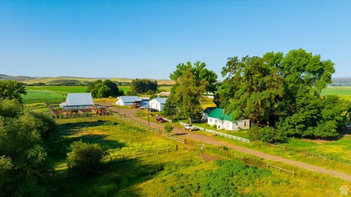 Aerial view of sparsely populated area featuring agricultural land