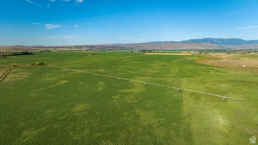Overview of rural landscape with a mountain backdrop
