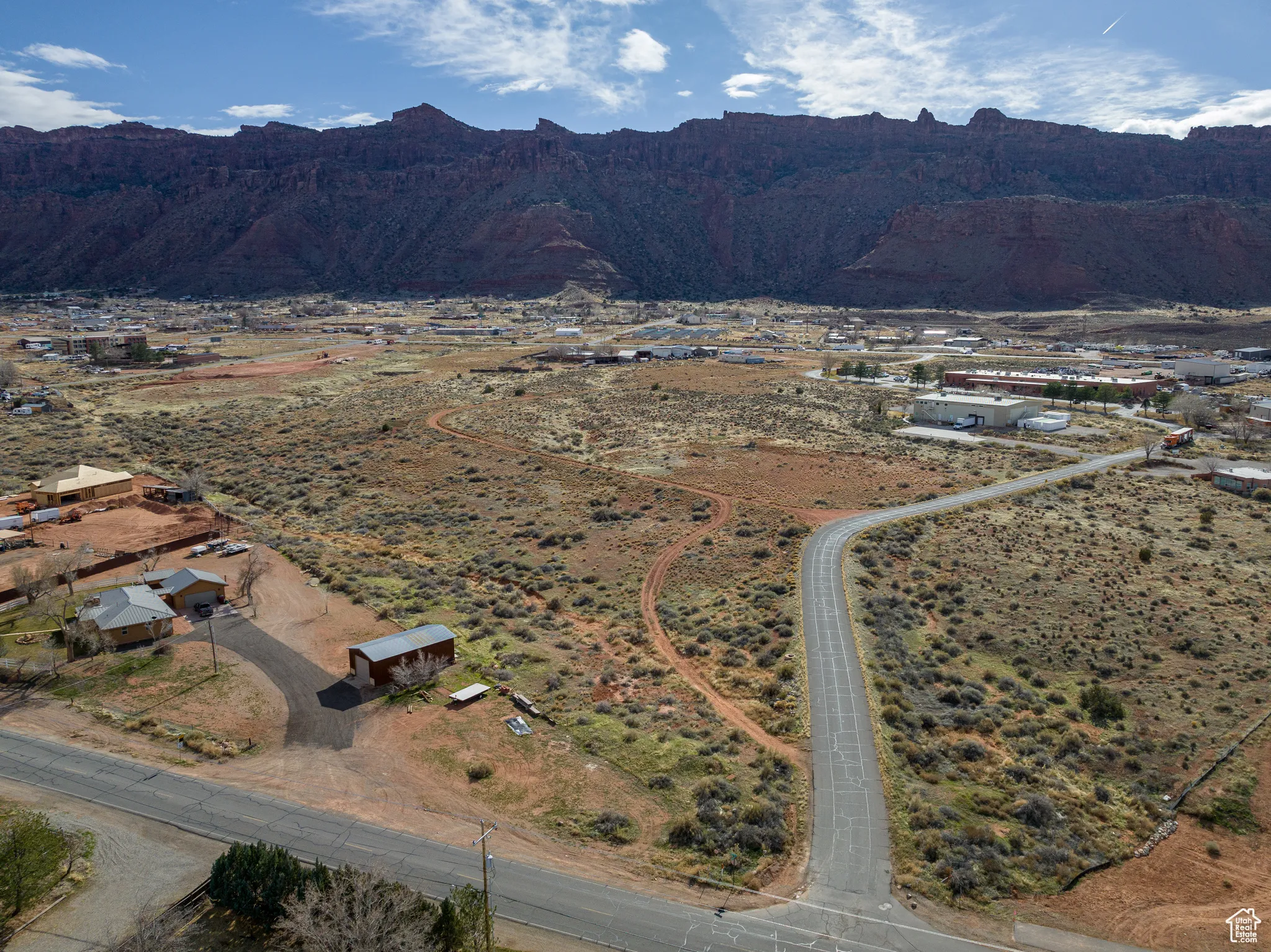 Aerial overview of property's location with mountains and rural landscape