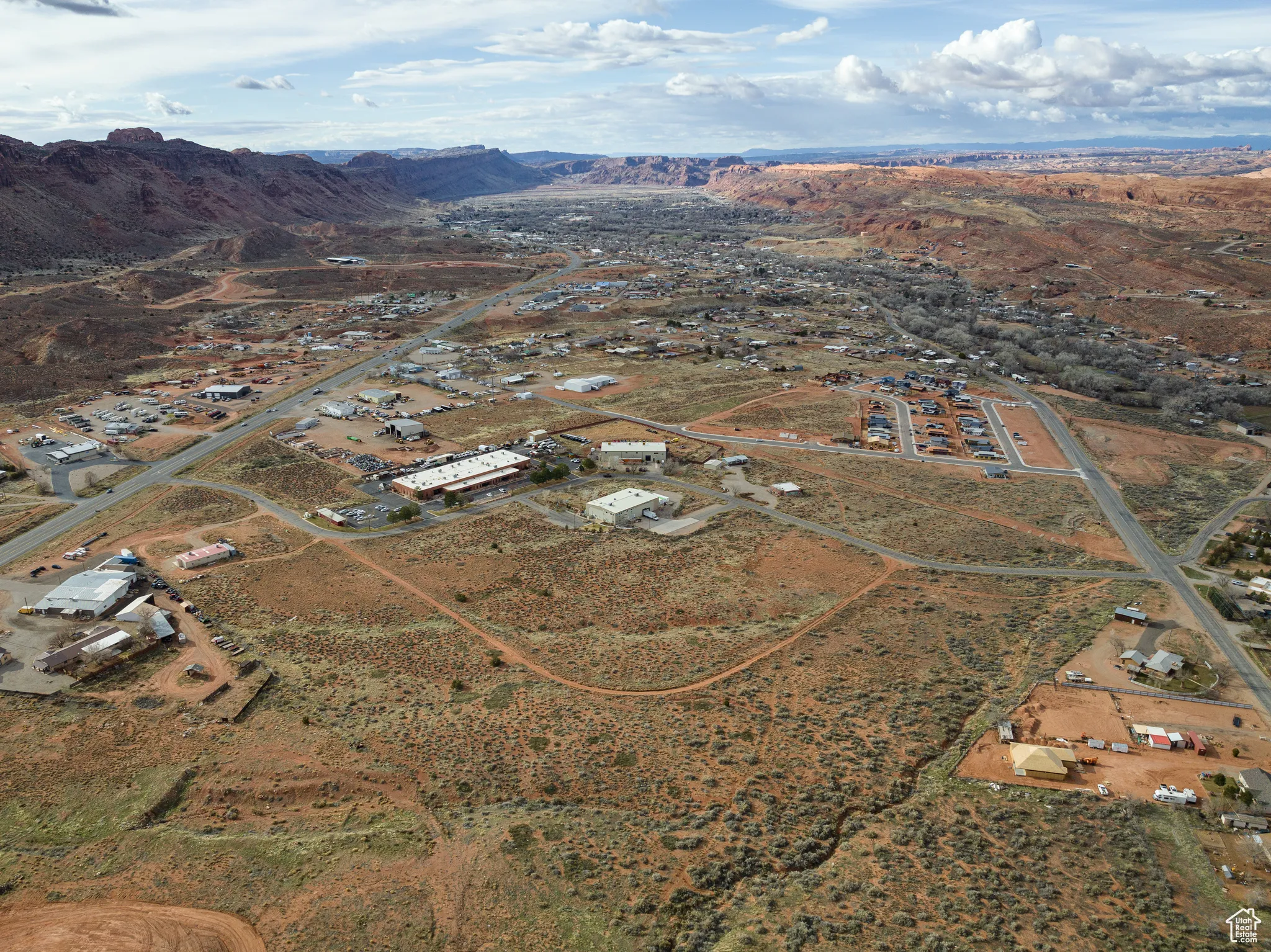 View of property location with a mountain backdrop and rural landscape