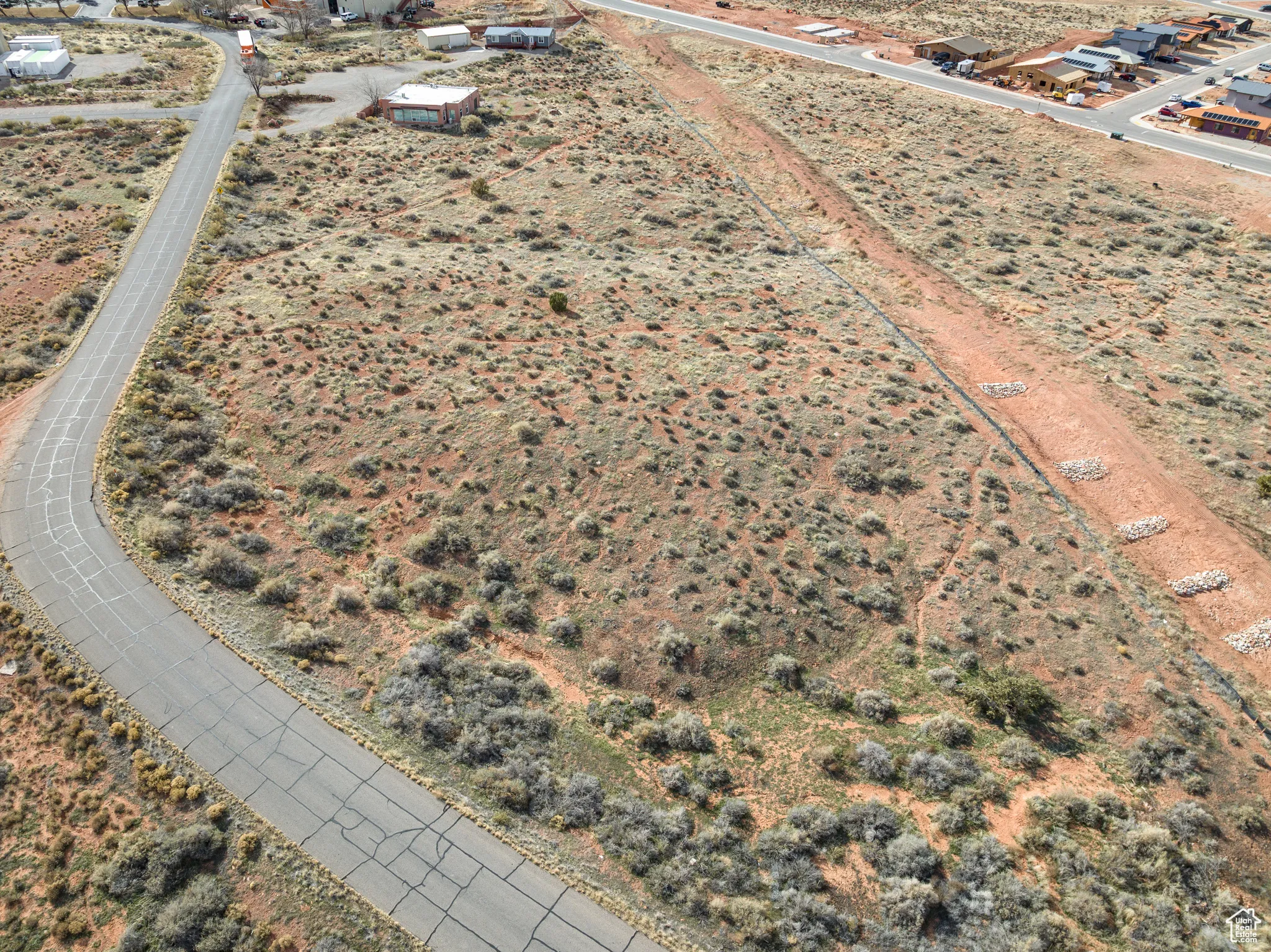 Aerial view of property and surrounding area featuring rural landscape and a desert landscape