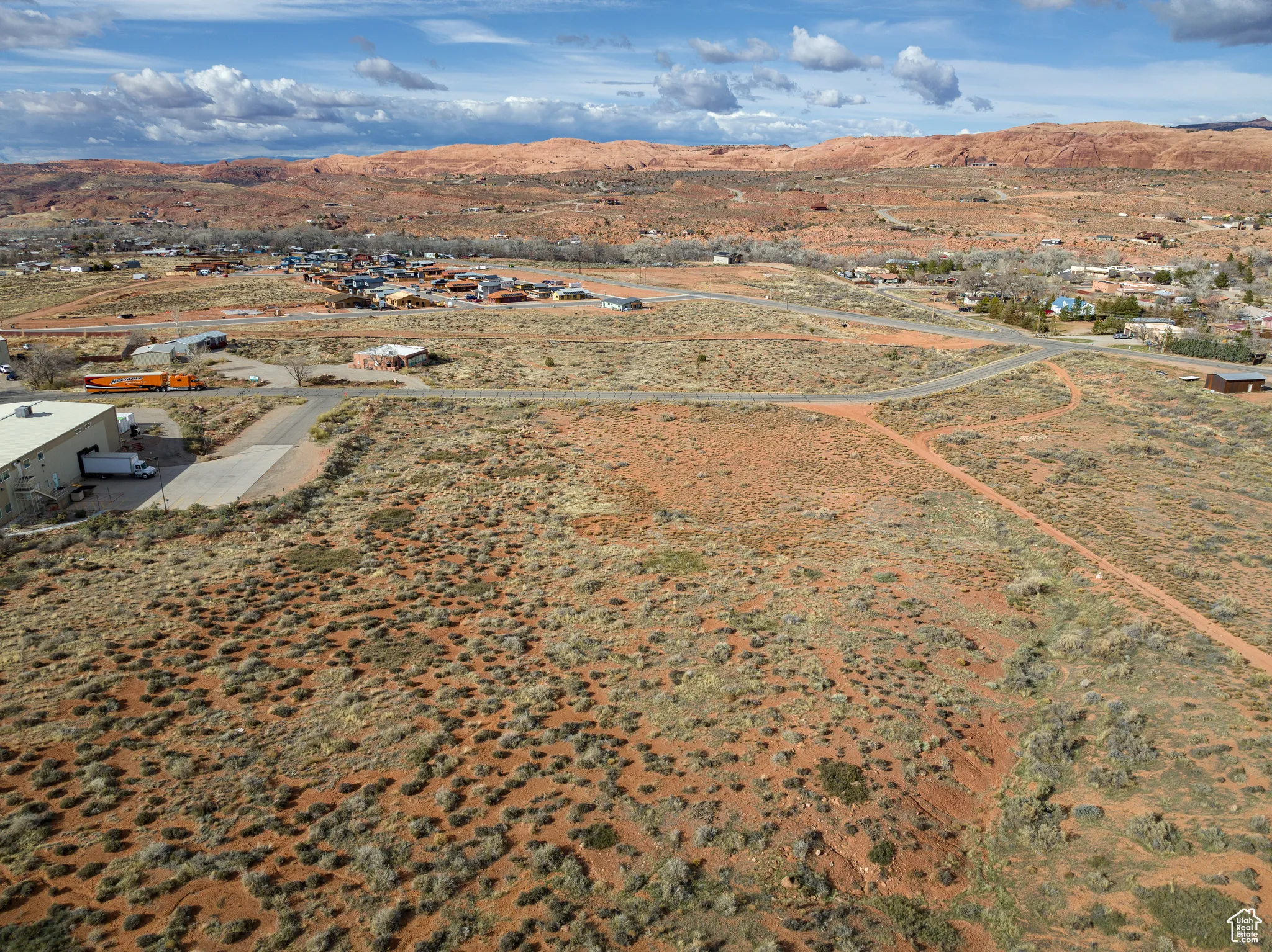 View of rural area with a desert landscape and mountains