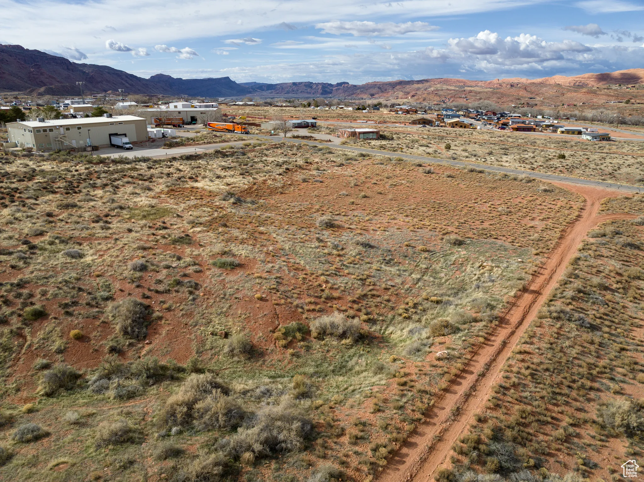 Aerial view of sparsely populated area with mountains