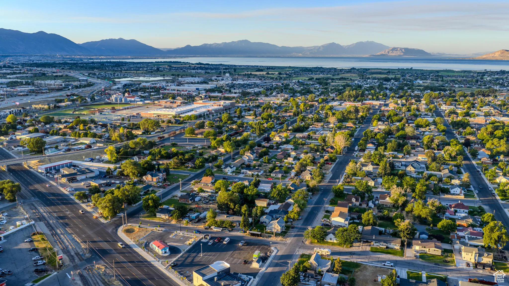 Aerial overview of property's location with a mountainous background