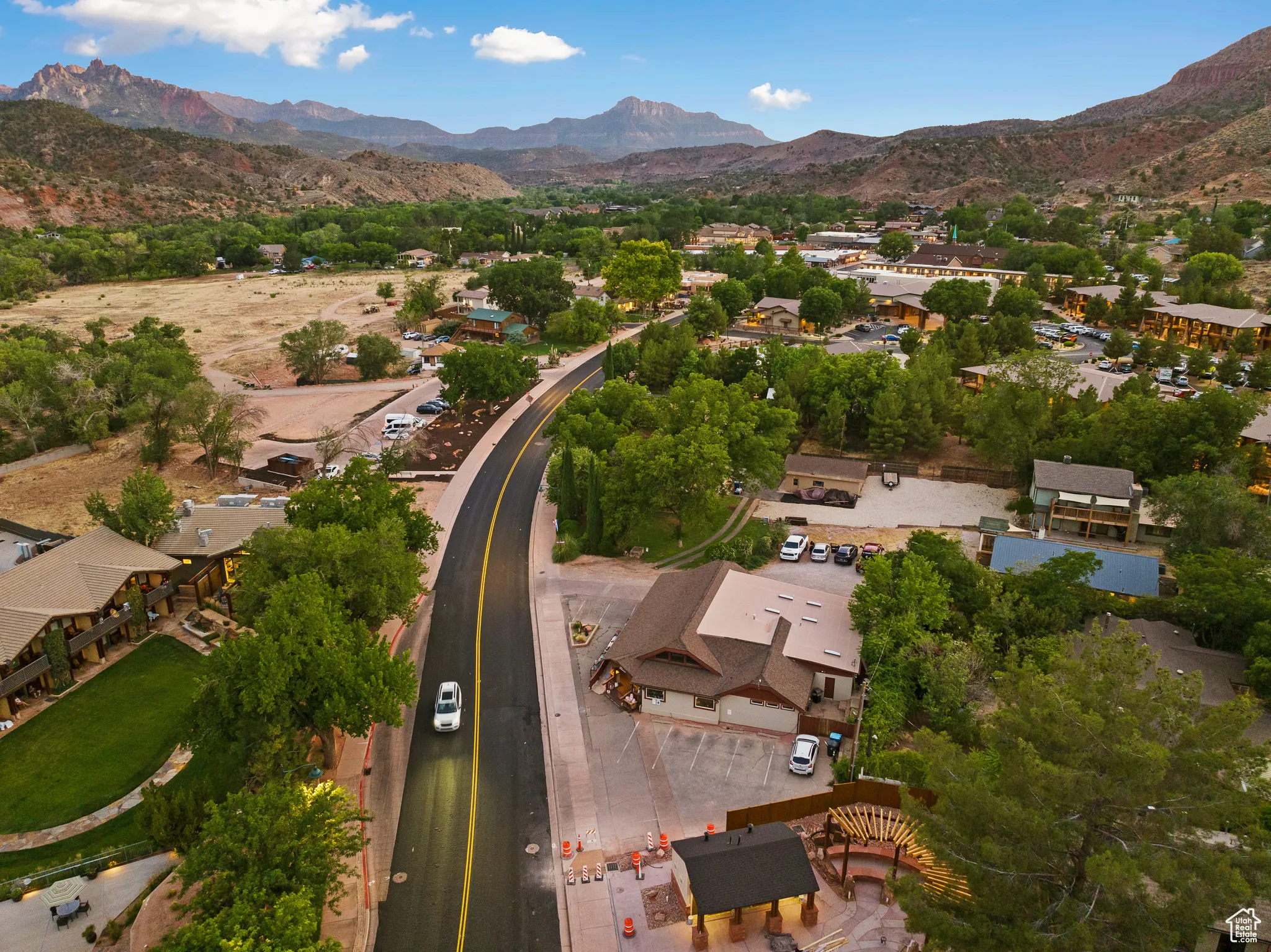 Aerial overview of property's location with a mountain backdrop