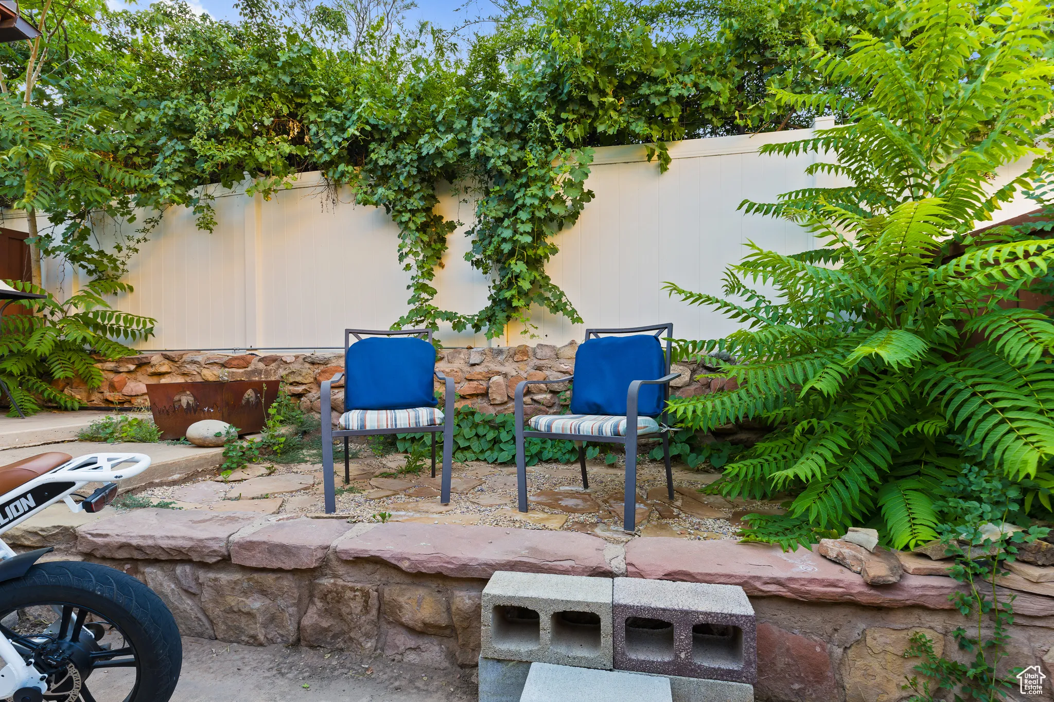 Fenced backyard featuring a patio area