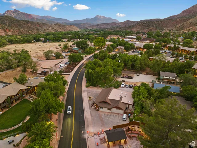 Aerial overview of property's location with a mountain backdrop