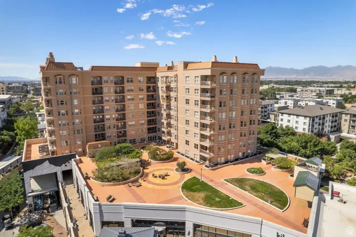 View of building exterior with a mountain view and a city view