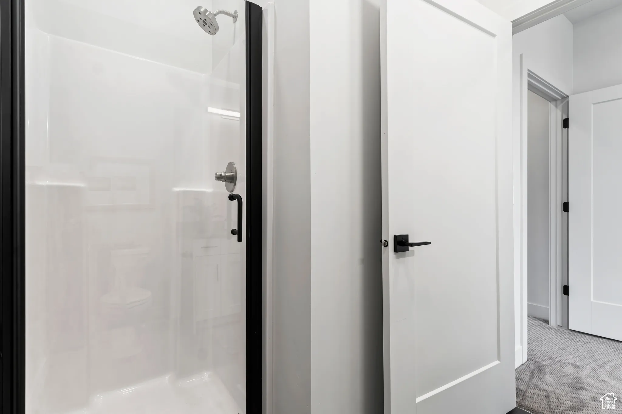 Bathroom featuring a stall shower
