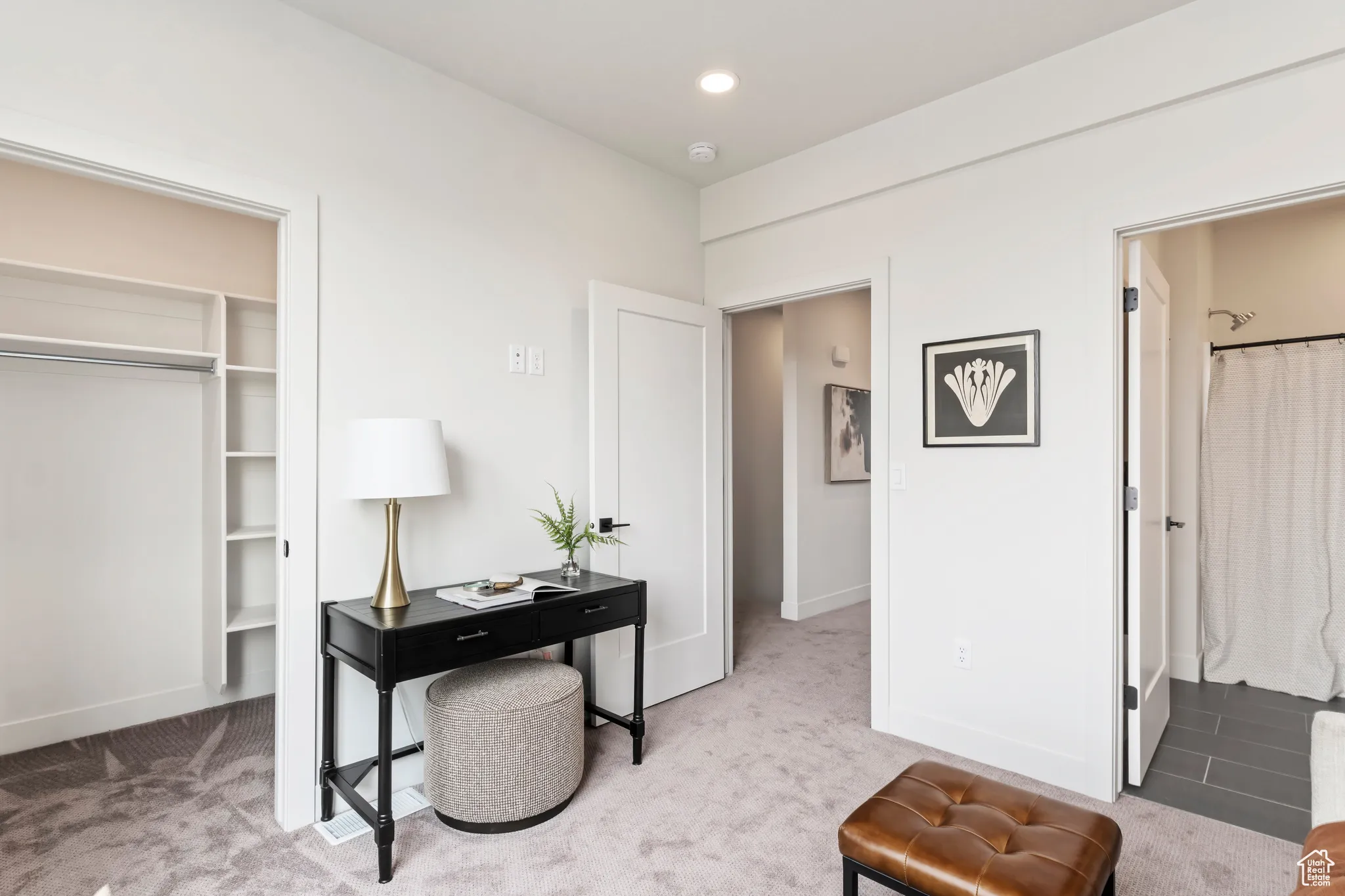 Office area with carpet floors and recessed lighting