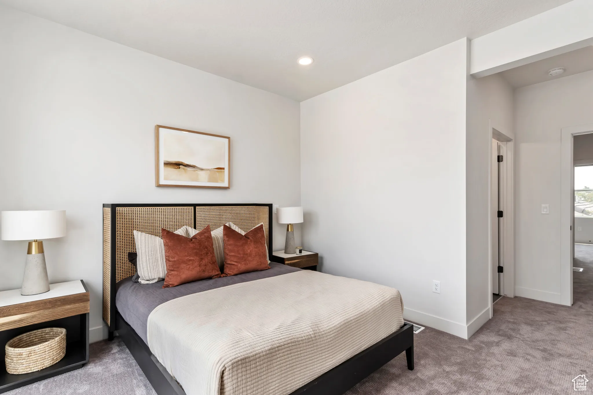 Carpeted bedroom featuring baseboards and recessed lighting