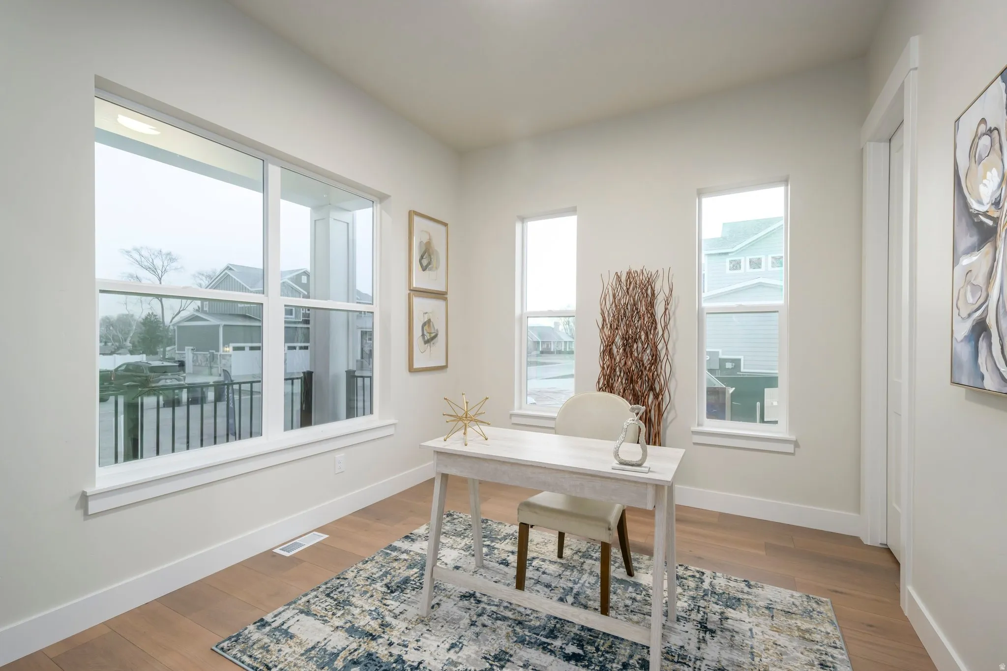 Office space featuring light wood-style floors
