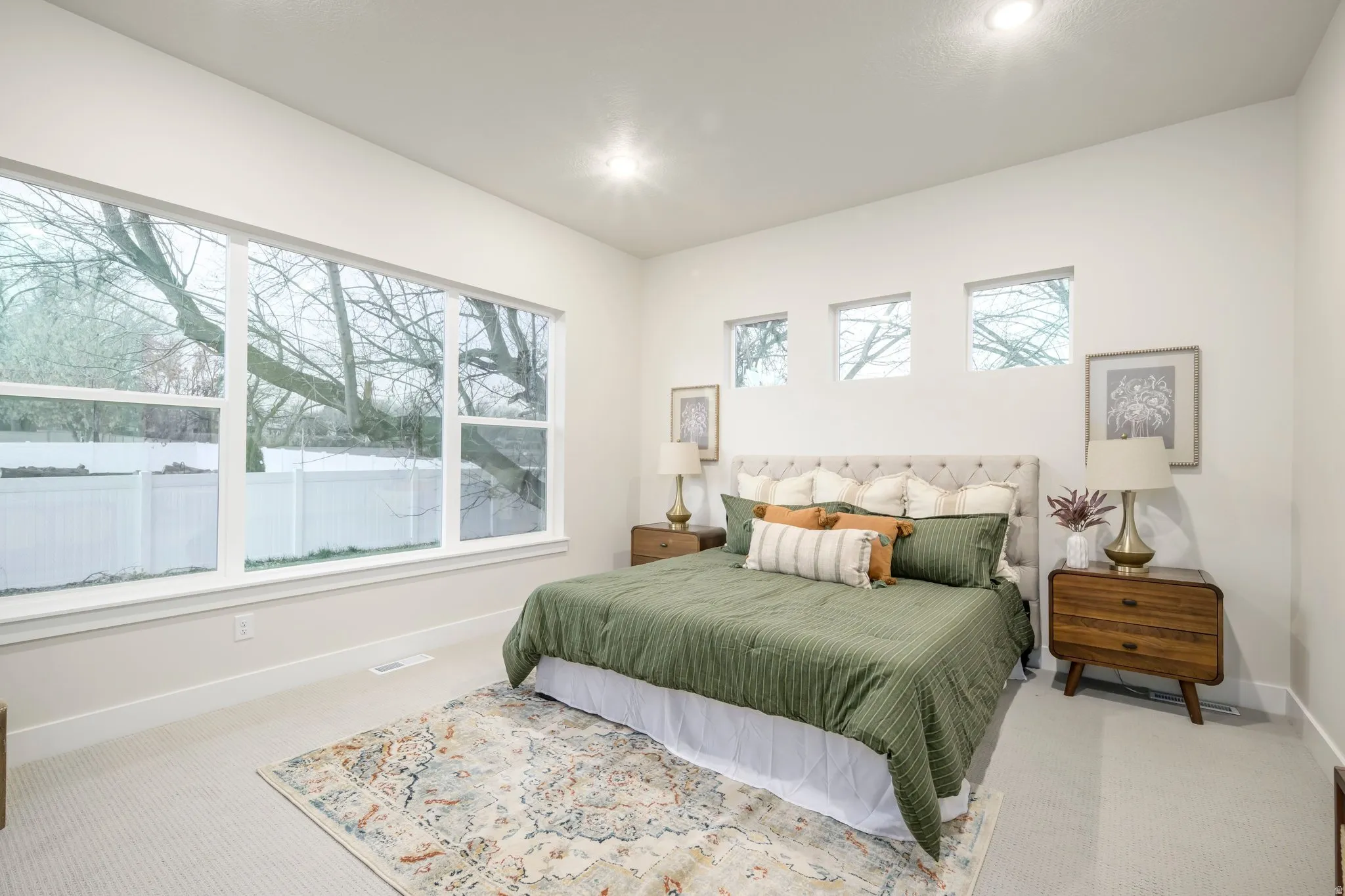 Carpeted bedroom featuring baseboards and recessed lighting