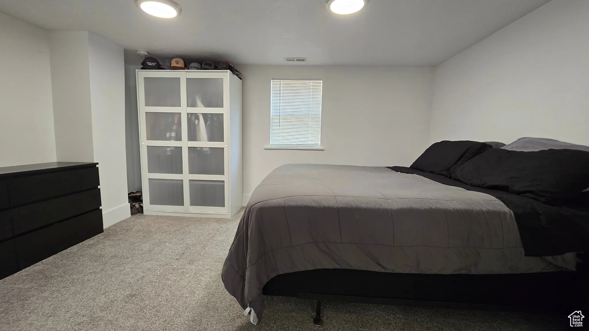 Bedroom featuring carpet flooring