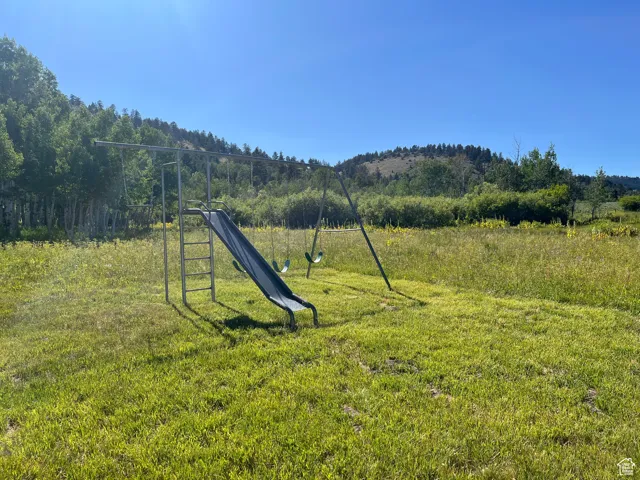 View of yard with a forest view