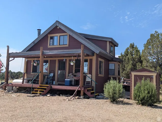 View of front of house with covered porch