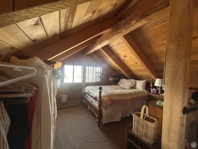 Bedroom featuring wood ceiling
