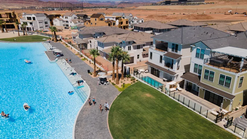 Aerial perspective of suburban area with a pool area