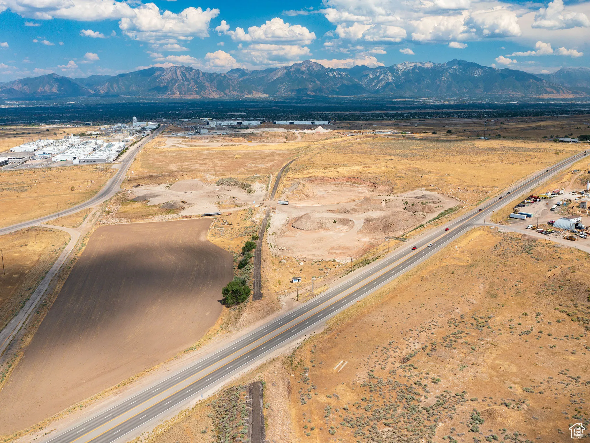 Aerial overview of property's location with mountains and rural landscape