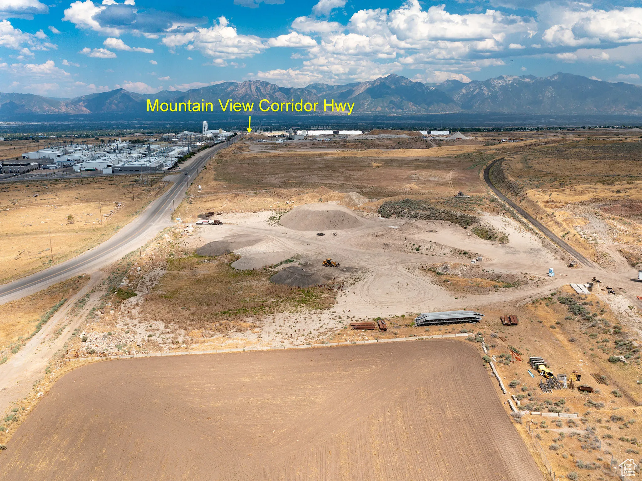 Overview of rural landscape with a mountain backdrop
