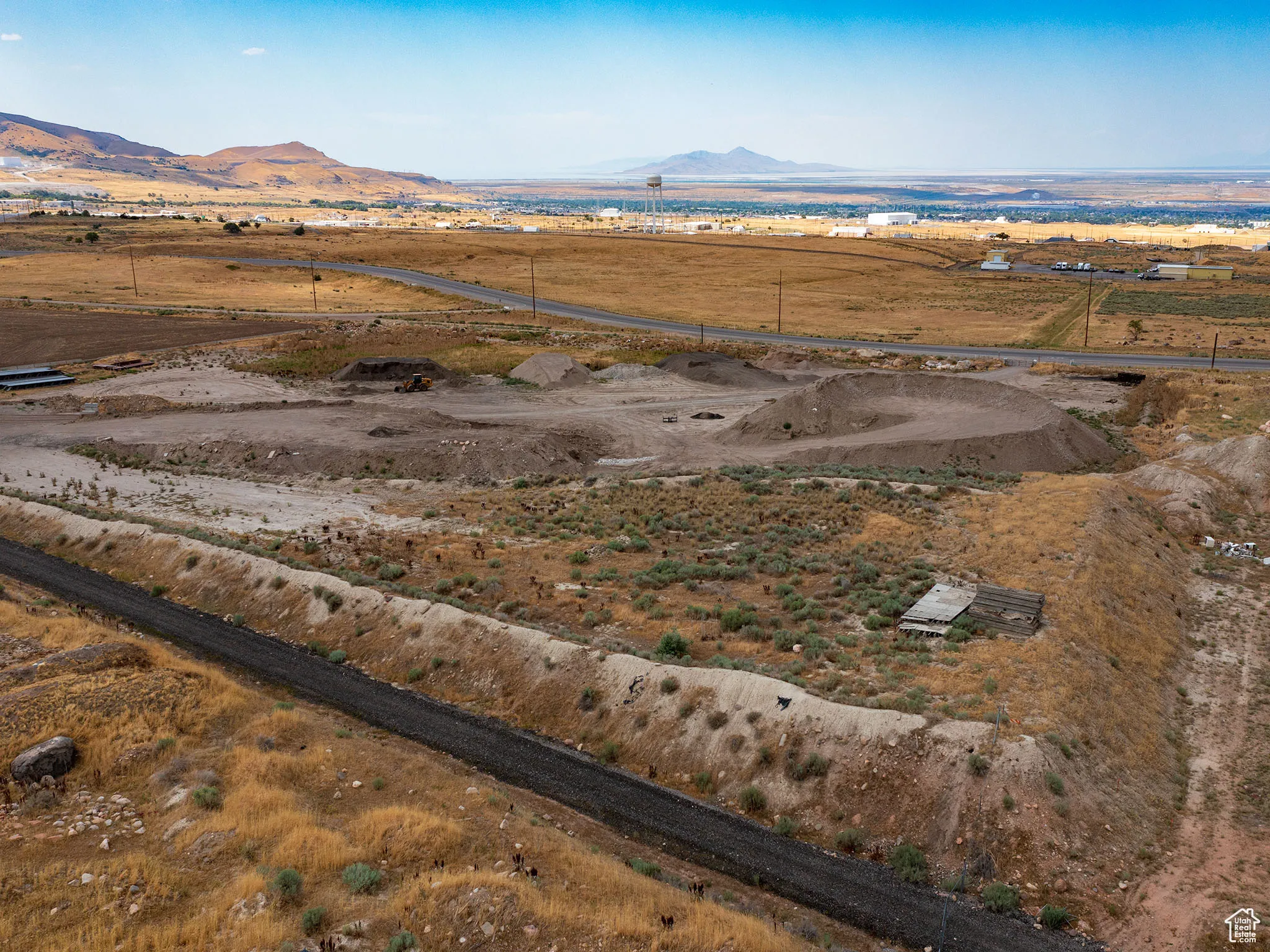 Aerial overview of property's location with mountains and rural landscape