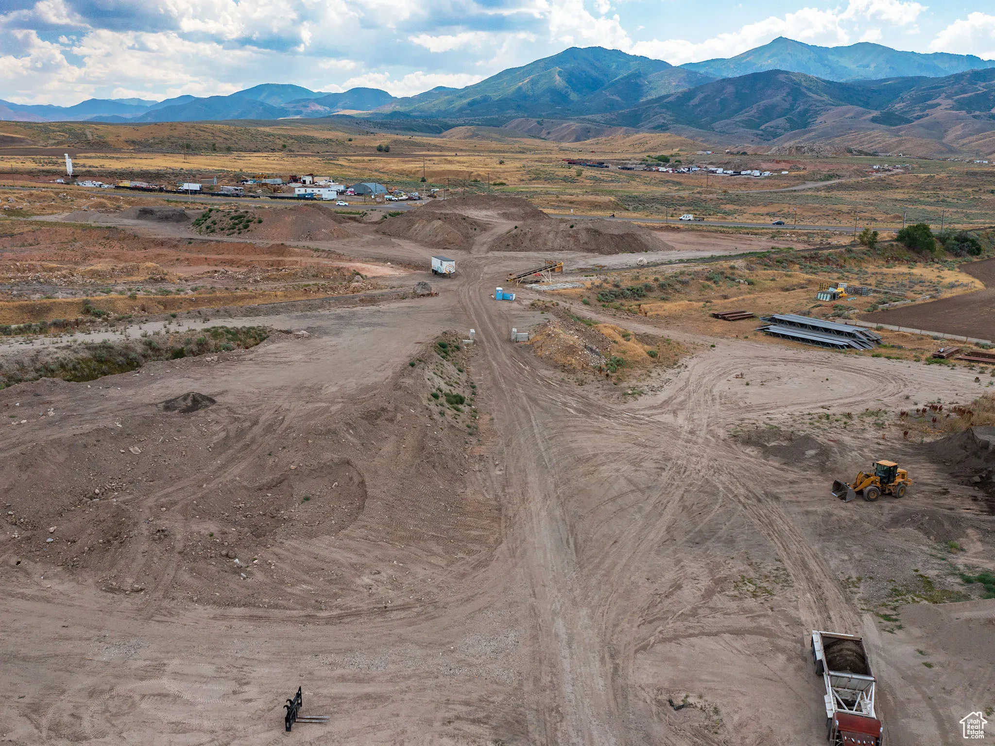 Aerial view of sparsely populated area with mountains