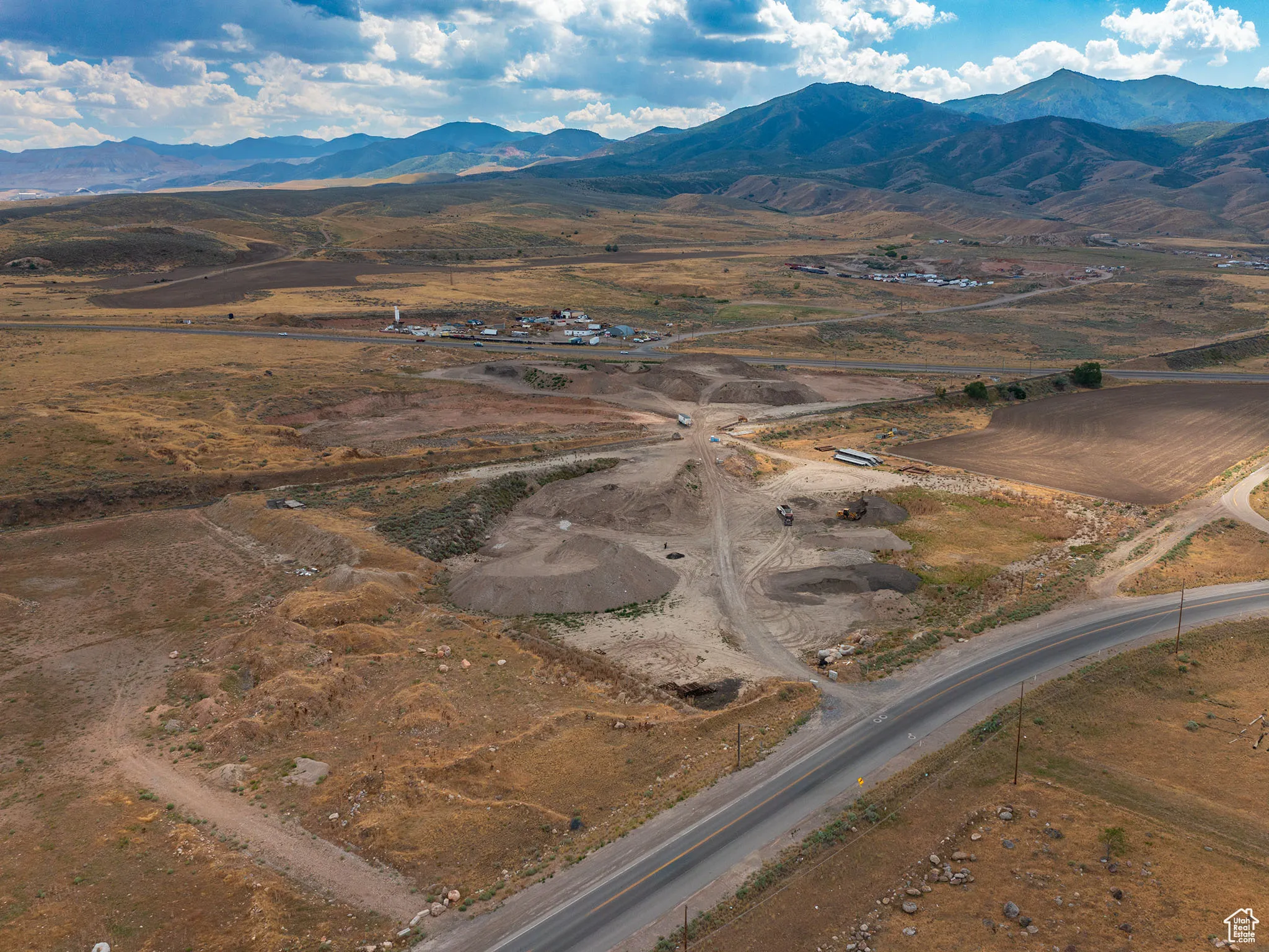View of property location with rural landscape and mountains