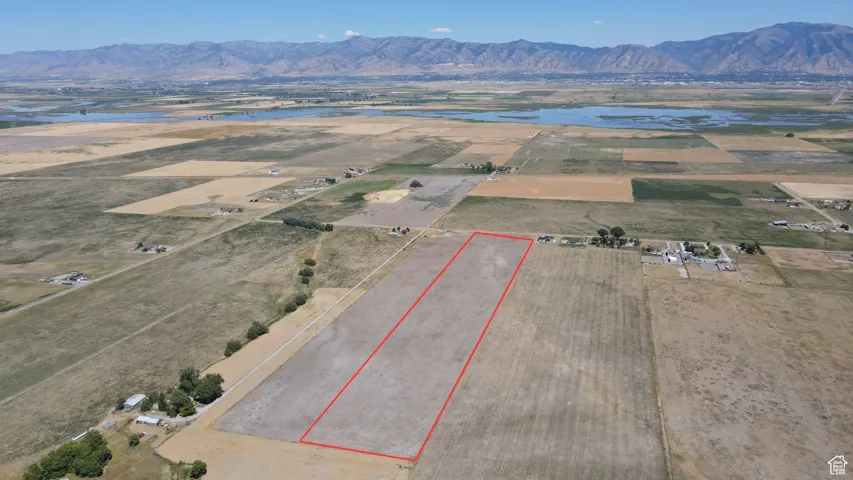 View of rural area featuring property boundaries highlighted and a water and mountain view