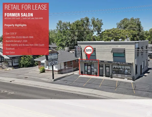 View of commercial location featuring uncovered parking