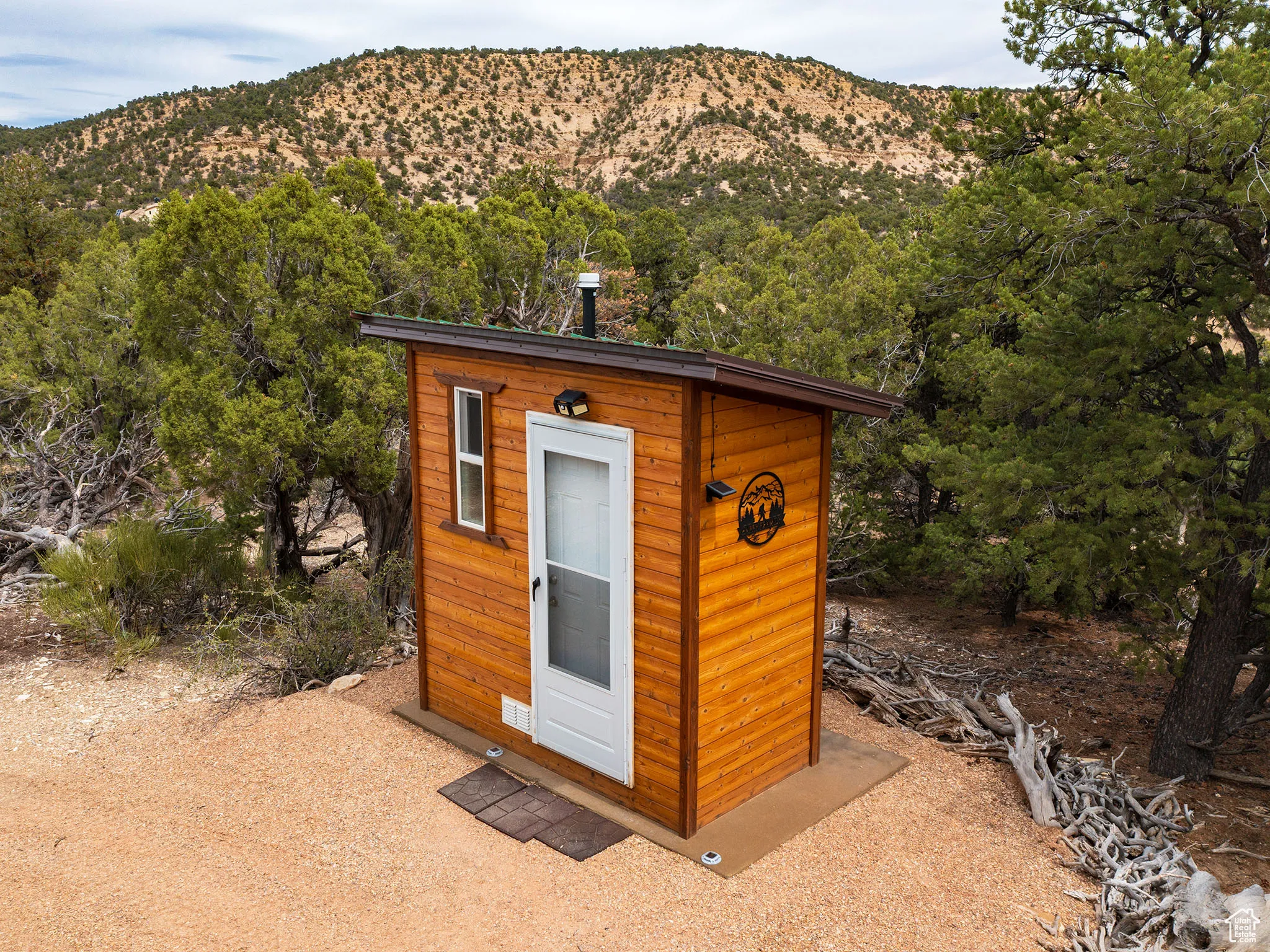 View of shed with a mountain view