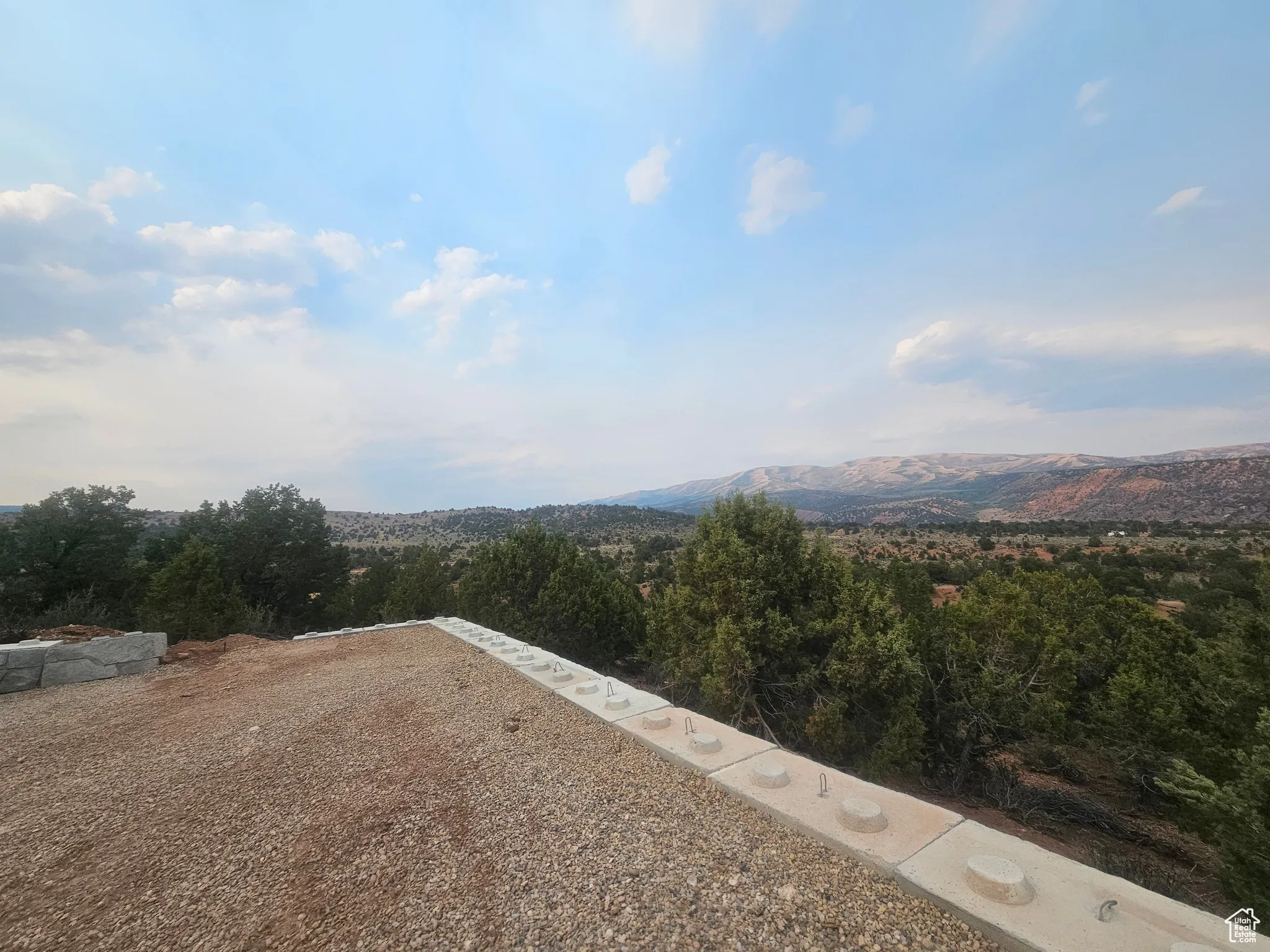 MAZING VIEWS!! Nice flat spot with retaining wall!
