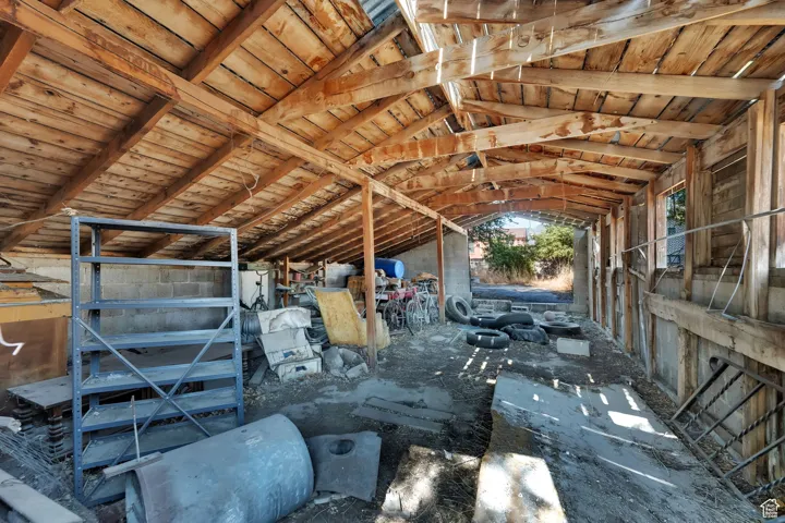 Miscellaneous room featuring vaulted ceiling and wood ceiling