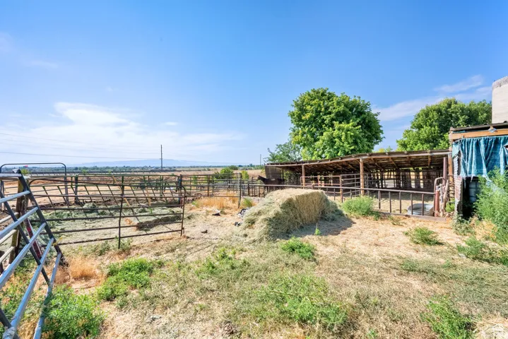 View of yard with an exterior structure, an outbuilding, and a view of countryside