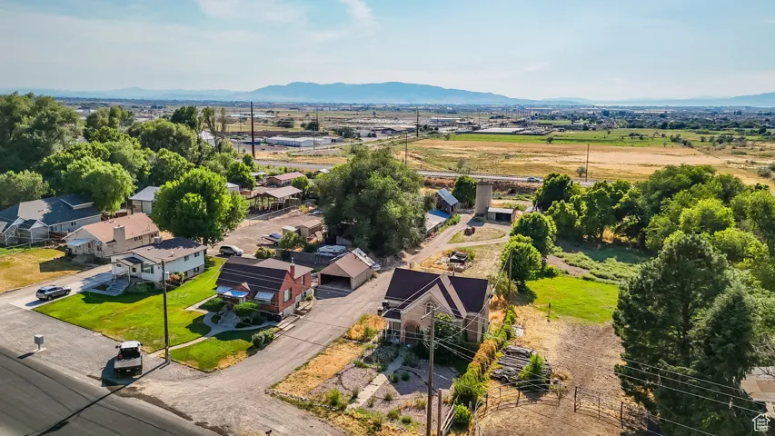 Aerial view of residential area featuring a mountain backdrop